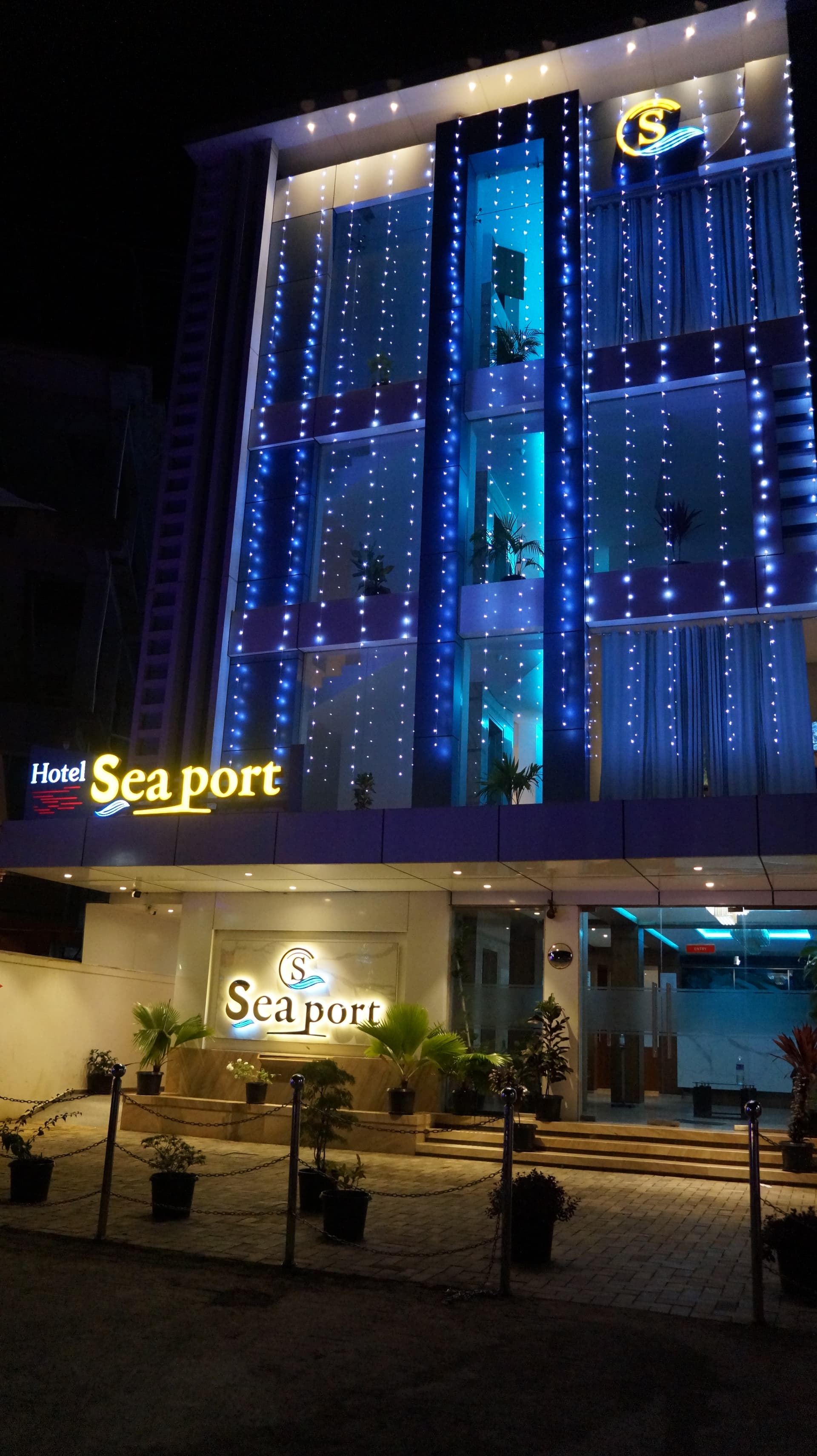 Hotel Sea Port — Illuminated Exterior at Night