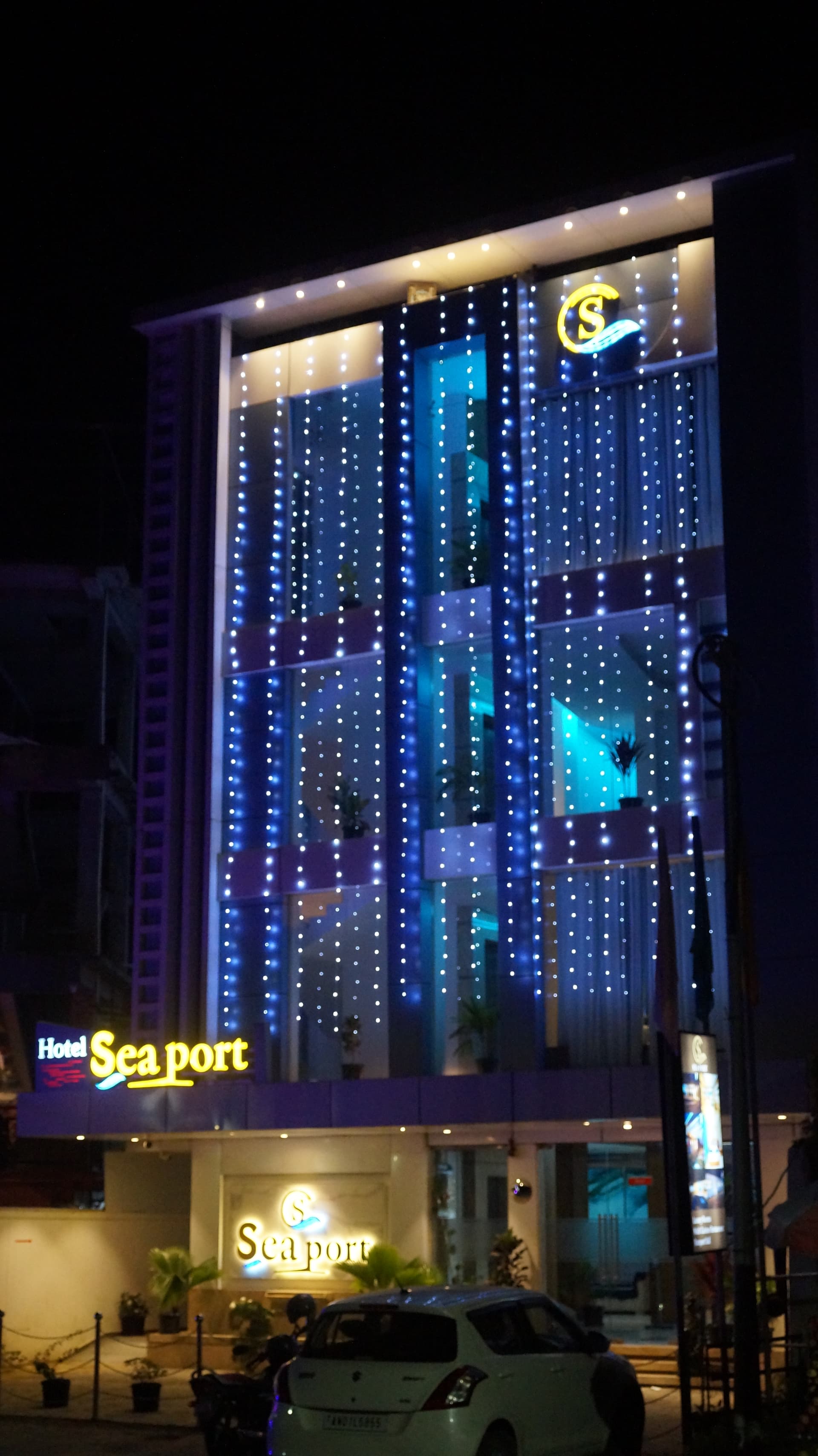 Hotel Sea Port — Lit Signage at Night